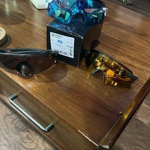 Two Oakley Encoder and one Oakley Kato.